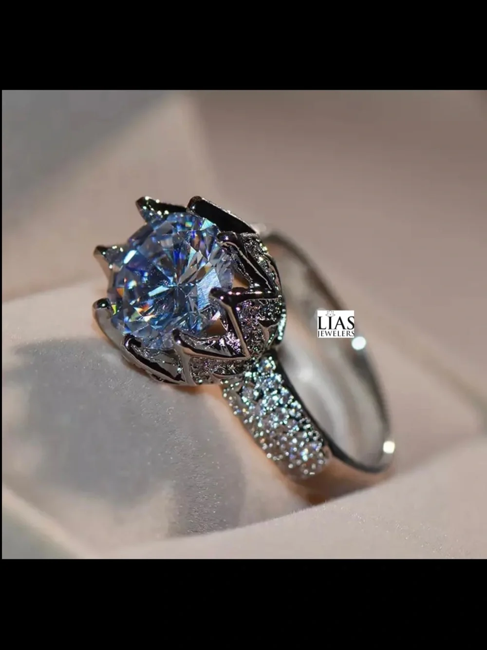 New 18k white gold engagement ring